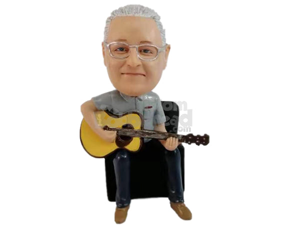 Custom Bobblehead Male playing the guitar sitting on his couch wearing button-down shirt - Musicians & Arts Strings Instruments Personalized Bobblehead & Action Figure Custom Bobblehead Male playing the guitar sitting on his couch wearing button-down shirt - Musicians & Arts Strings Instruments Personalized Bobblehead & Action Figure